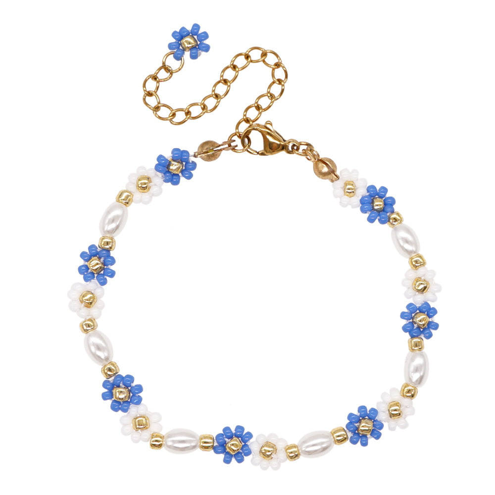 Ojos navideños al por mayor flor anillo de oro sonriente hebilla pulsera de vidrio elástico